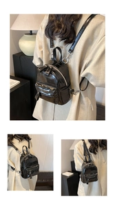 Gros plan d'un mini sac à dos en cuir PU noir brillant avec fermetures éclair argentées