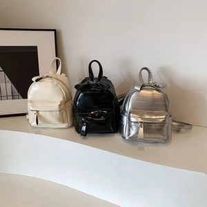 Mini sac à dos en cuir PU pour femme avec nœud papillon en blanc, noir et argent brillant