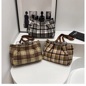 Chic plaid tote bags with leather handles and metallic ring detail in various colors