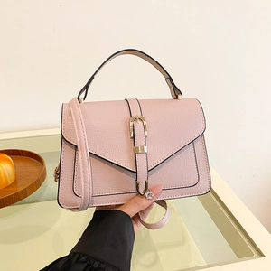 Pink lychee texture handbag with top handle and gold metal buckle for women