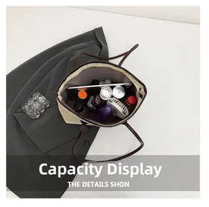 Top view of spacious tote bag interior showing capacity for tablet and daily essentials