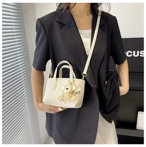 Litchi pattern mini bucket bag in cream white with cute bear charm and gold hardware detail