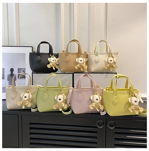 Minimalist litchi grain mini bucket bags in multiple colors with cute bear charms