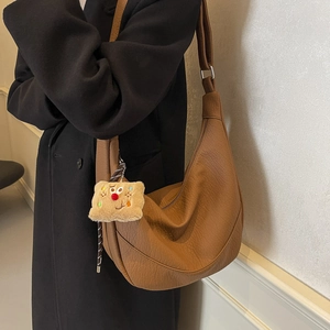 Retro brown hobo shoulder bag with litchi texture and cute plush pendant charm