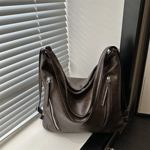Vintage dark brown large tote bag with dual zippers and high-end leather texture