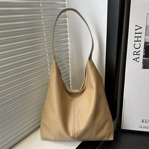 Beige large hobo shoulder bag with litchi grain texture for stylish daily commuting