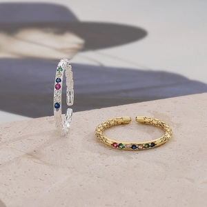 Elegant S925 silver adjustable rings featuring colorful gemstones and relief textures