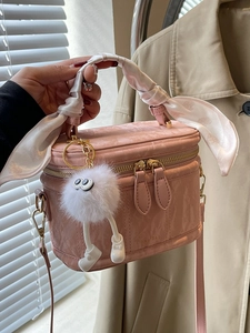 Pink vanity box bag with textured finish, silk scarf handle and cute plush charm