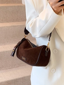 Retro brown suede pillow bag with golden zippers and wide strap for elegant office style