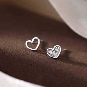 Elegant S925 silver asymmetrical hollow heart earrings with shimmering zircon stones