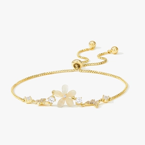Golden cat eye stone flower bracelet with butterfly charms and adjustable sliding clasp