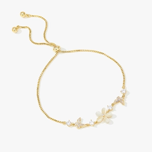 Adjustable gold flower bracelet with opal-like petals and sparkling zircon butterflies