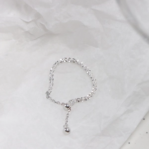 Sparkling adjustable silver bead ring with a pull-chain design on a white background