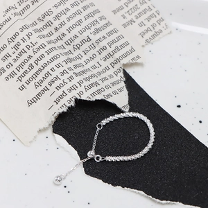 Adjustable silver sparkle bead chain ring with slide mechanism in minimalist style