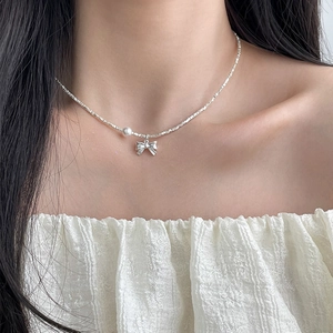 925 silver irregular chain necklace featuring a sweet bow pendant and white pearl