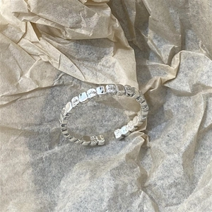 Irregular textured square silver open ring with unique hammered metal surface for women