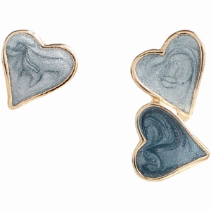 Detail of blue heart studs showing gold metal frame with drip oil enamel texture