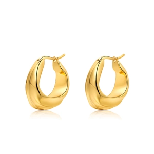 Minimalist thick gold irregular pleated hoop earrings with polished metallic finish
