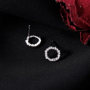 Minimalist S925 sterling silver circular stud earrings with pave set zircon crystals
