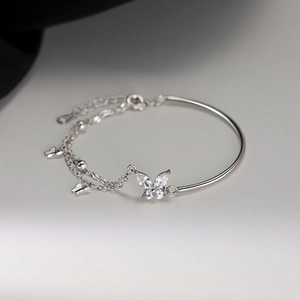 Silver butterfly bracelet with zircon inlay and double layer chain in minimalist style