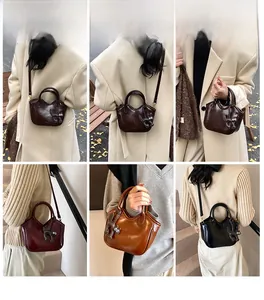 Detailed view of glossy oil wax leather tote bags in dark brown, burgundy, and black finishes