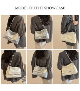 Chic women carrying solid color underarm tote bags with silver chain straps in a cafe setting