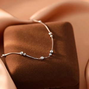 Elegant S925 sterling silver bead anklet with polished balls on a minimalist box chain