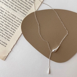 Minimalist silver water drop tassel necklace for women with a sleek polished finish