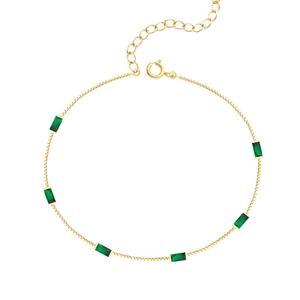 Elegant gold chain bracelet featuring rectangular emerald green stones with adjustable clasp
