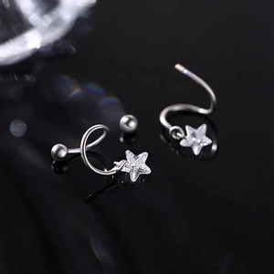 Elegant S925 silver spiral earrings with clear crystal star charms on a reflective surface