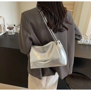 Detail of silver pleated shoulder bag with chain strap and WEGOOO embossed logo