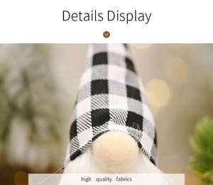 Macro detail of gnome plush featuring black and white plaid fabric and high quality beard