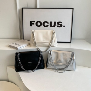 Minimalist chain shoulder bags in white black and silver with wrinkled faux leather finish