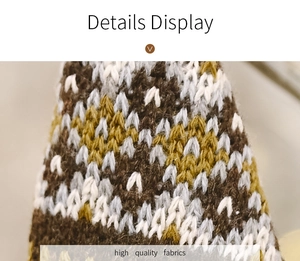 Macro shot of knitted fabric showing multicolored geometric patterns and high quality texture