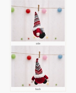 Detail view showing the side and back of a red knitted Christmas gnome plush ornament