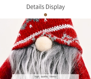 Detailed view of high quality fabrics on Christmas gnome with red striped hat