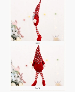 Side and back view of a Christmas gnome doll with long striped legs and festive knit hat