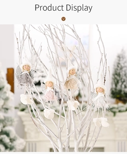 Detailed view of plush angel ornaments with knit hats and wings for Christmas trees