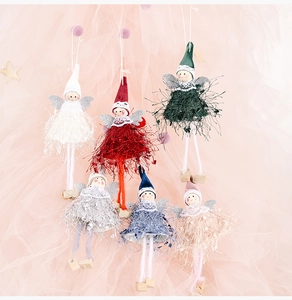 Detailed view of six colorful plush Christmas angel dolls with knit textures and wings