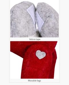Detail of Christmas curtain buckle with velcro fastener and movable legs with heart patch