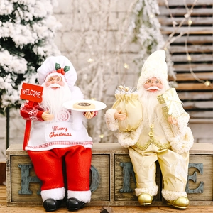 Standing Santa Claus figurines with chef and champagne gold themes for Christmas decor