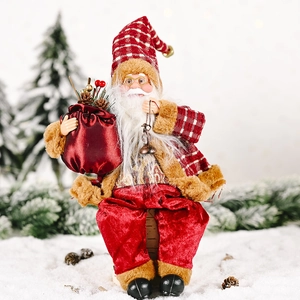 Standing Santa Claus doll in red velvet and plaid fabric with gift bag and pine cones