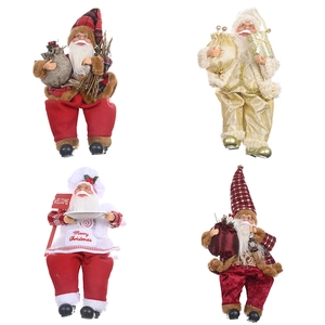 Set of four standing Santa Claus figurines in red plaid and champagne gold outfits