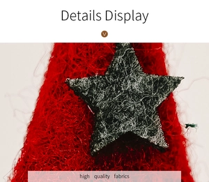 Detail showing a gray felt star on red high-quality fabric of a Christmas gnome doll