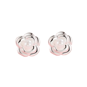 Elegant silver camellia flower earrings with a centered pearl on a white background