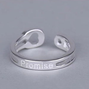 Adjustable silver minimalist open ring with Promise engraving and matte finish