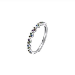 Chic wavy silver ring with colorful zircon gemstones in a minimalist vibrant design