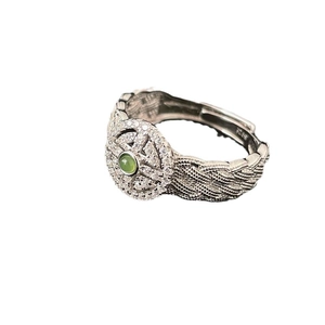Vintage woven S925 silver ring with a round green jade stone and zircon halo