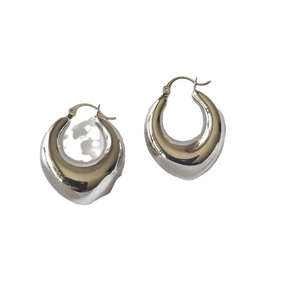 Polished silver chunky teardrop hoop earrings with minimalist high-shine metallic finish