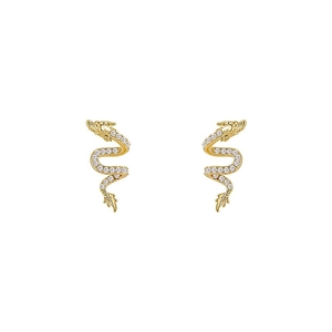 Golden dragon stud earrings with sparkling white crystals in a minimalist 2024 luxury style